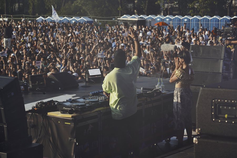 L.B.ONE at the decks overlooking a festival crowd